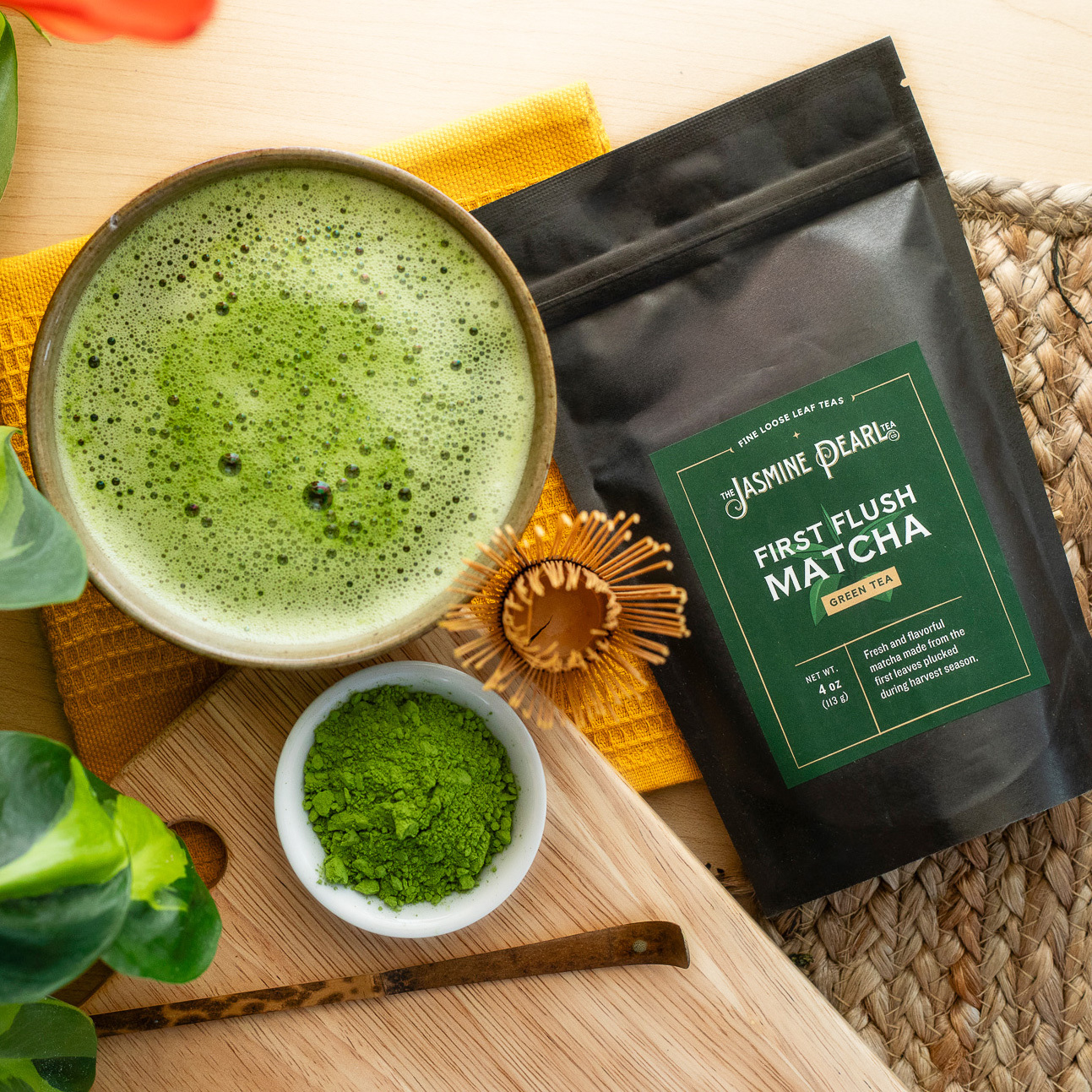 Matcha green tea and a whisk